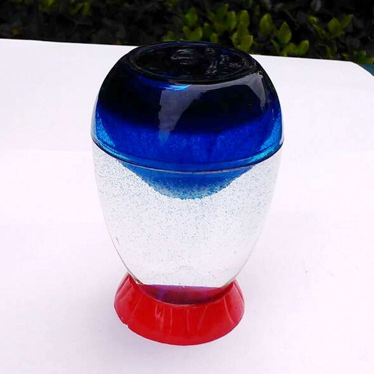 modern acrylic hourglass showing sand flow