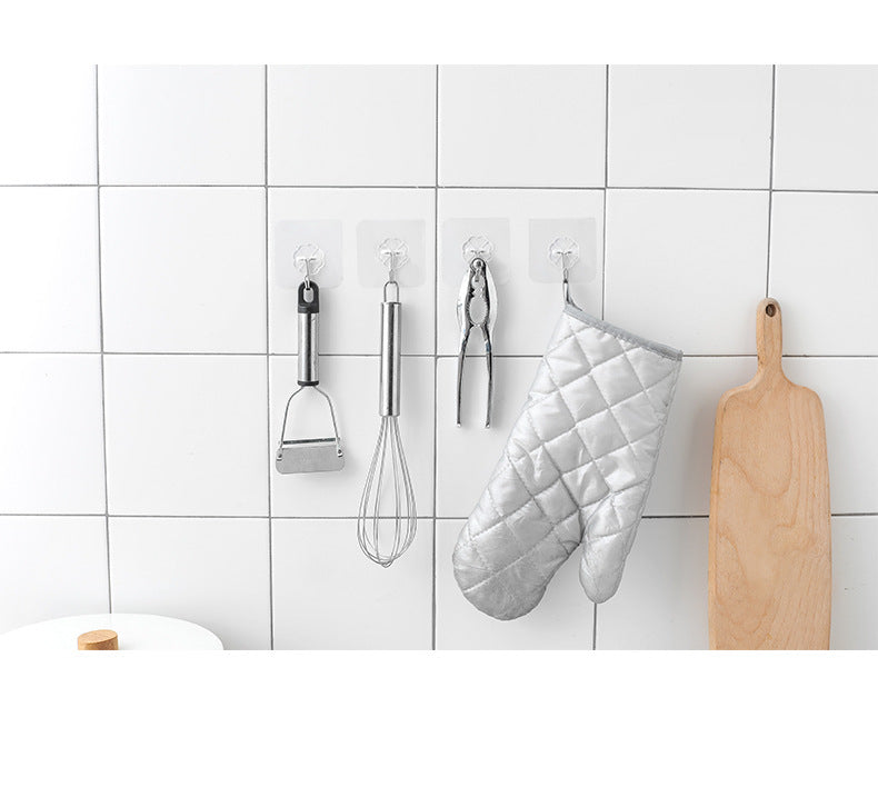 kitchen utensils hanging on transparent hooks