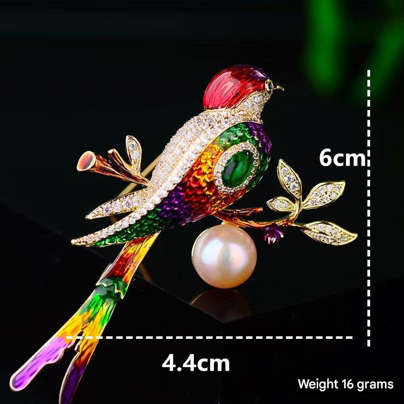 Chic Enamel Magpie Brooch displayed on fabric
