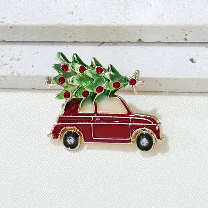 Beautifully designed Christmas Brooch with car and tree