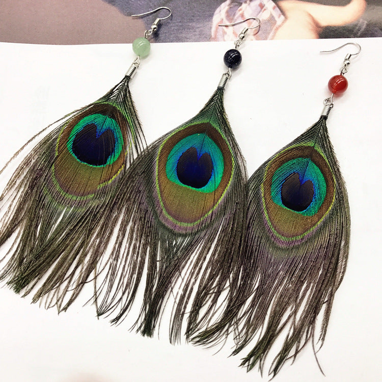Lightweight long earrings worn by a fashion model
