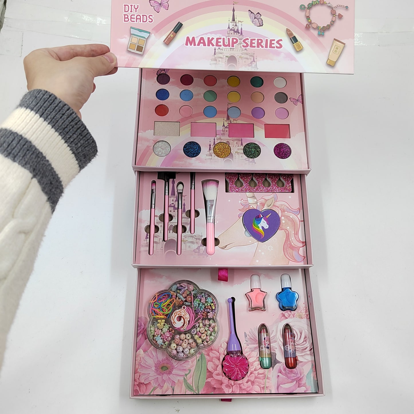 Close-up of unicorn themed makeup kit for children