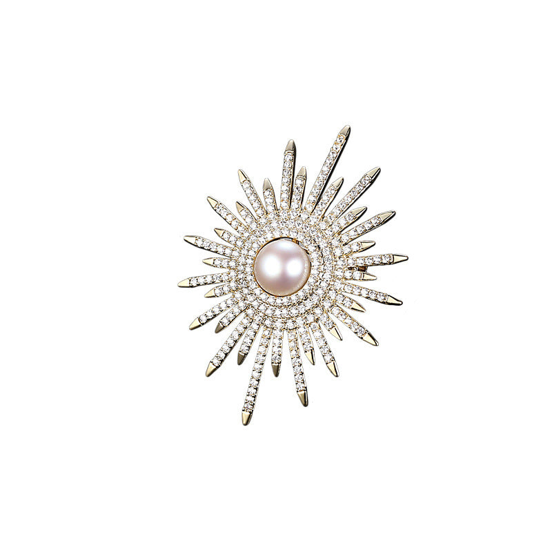 Gold and silver sunflower brooch details