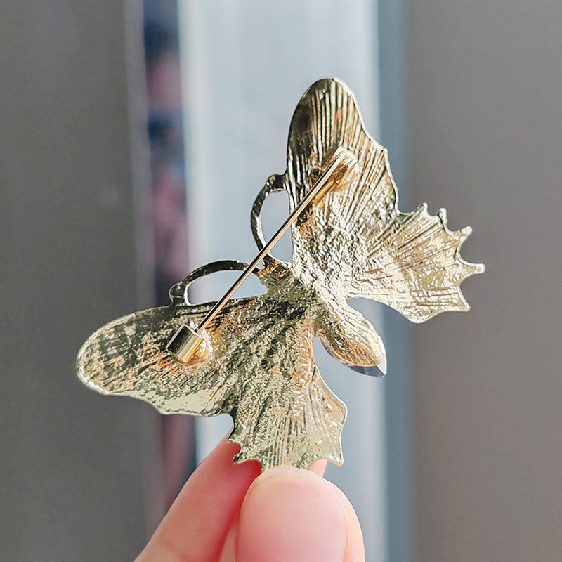 brooch worn on a scarf