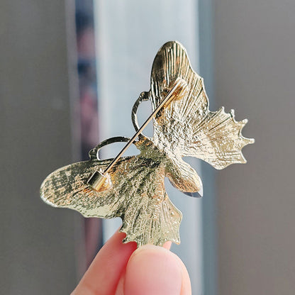brooch worn on a scarf