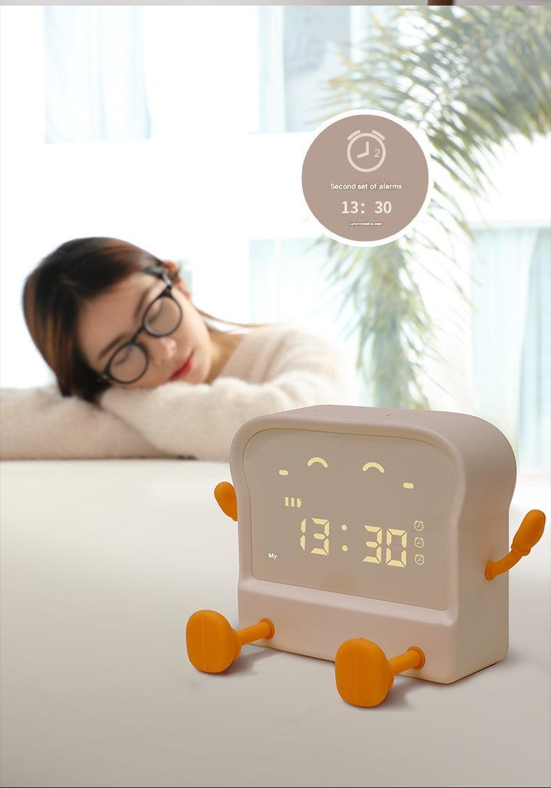 glowing night light feature on cartoon alarm clock