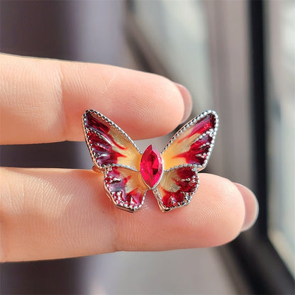Colorful crystal butterfly brooch on jacket