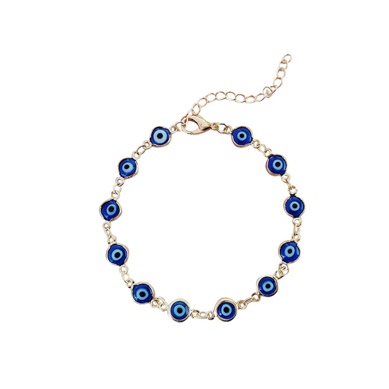 Turquoise Blue Evil Eye Bracelet on Table