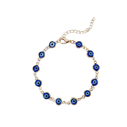 Turquoise Blue Evil Eye Bracelet on Table