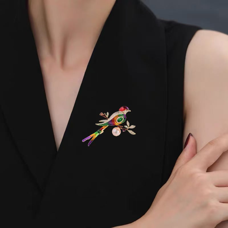 Colorful animal brooch close-up view