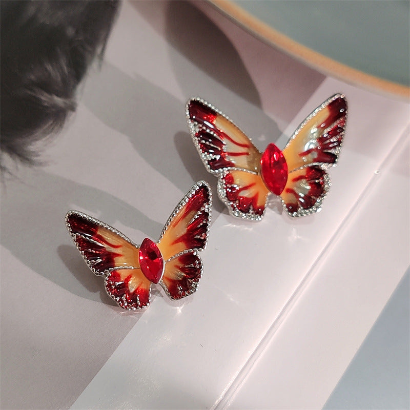 Colorful crystal butterfly brooch on jacket