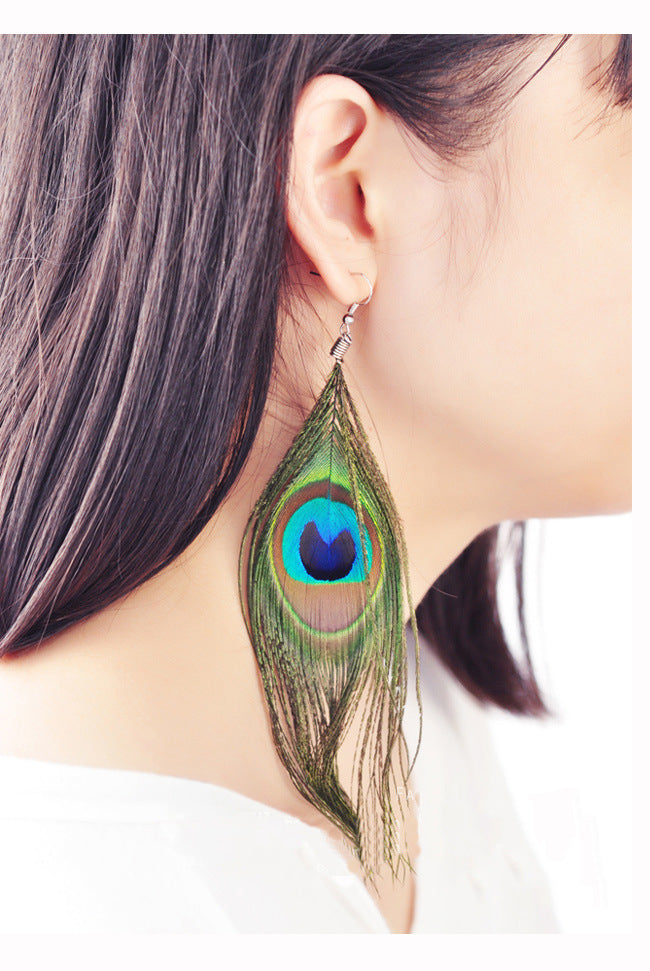 Lightweight long earrings worn by a fashion model