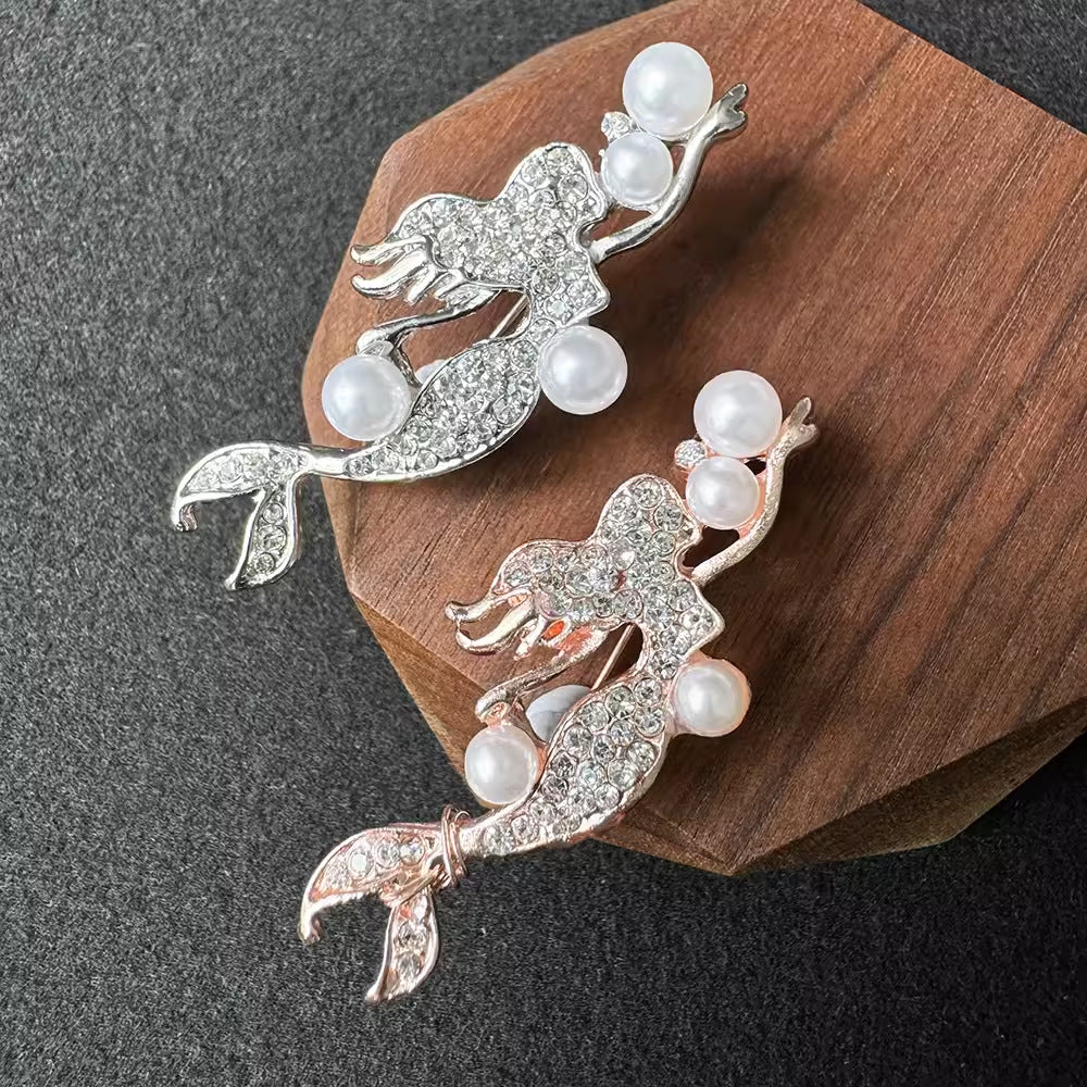 Silver alloy mermaid brooch with crystal embellishments