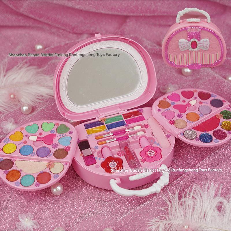 girl's pink cosmetic case with makeup products