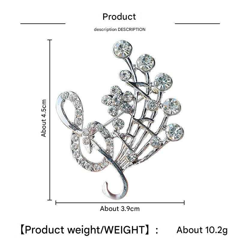 Heart-shaped musical note brooch design