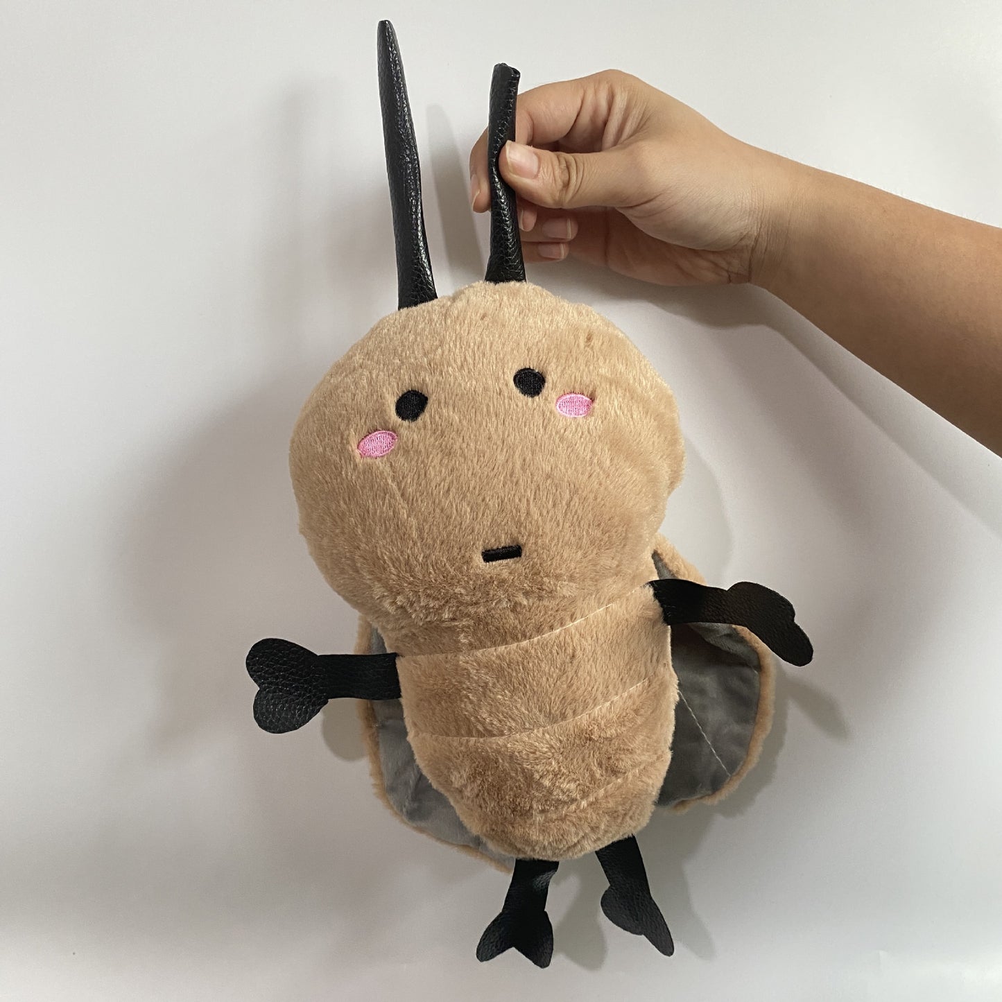 quirky roach plush toy