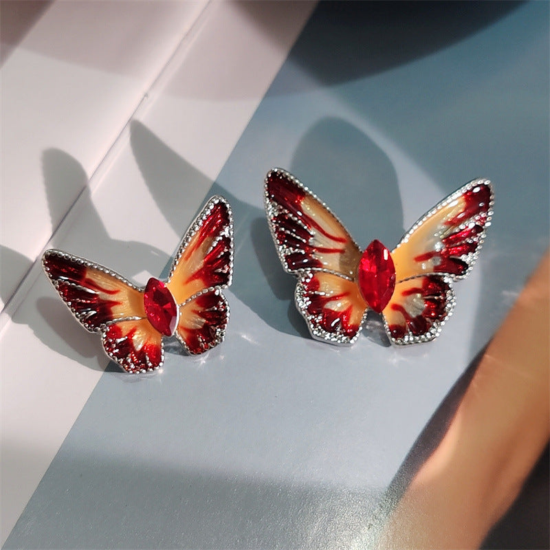 Colorful crystal butterfly brooch on jacket