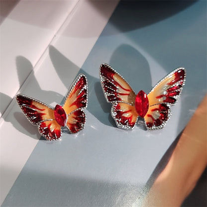 Colorful crystal butterfly brooch on jacket