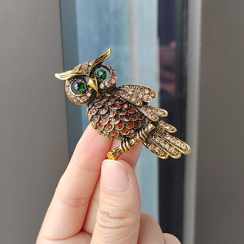 Close-up of sparkling crystals on owl brooch image 3
